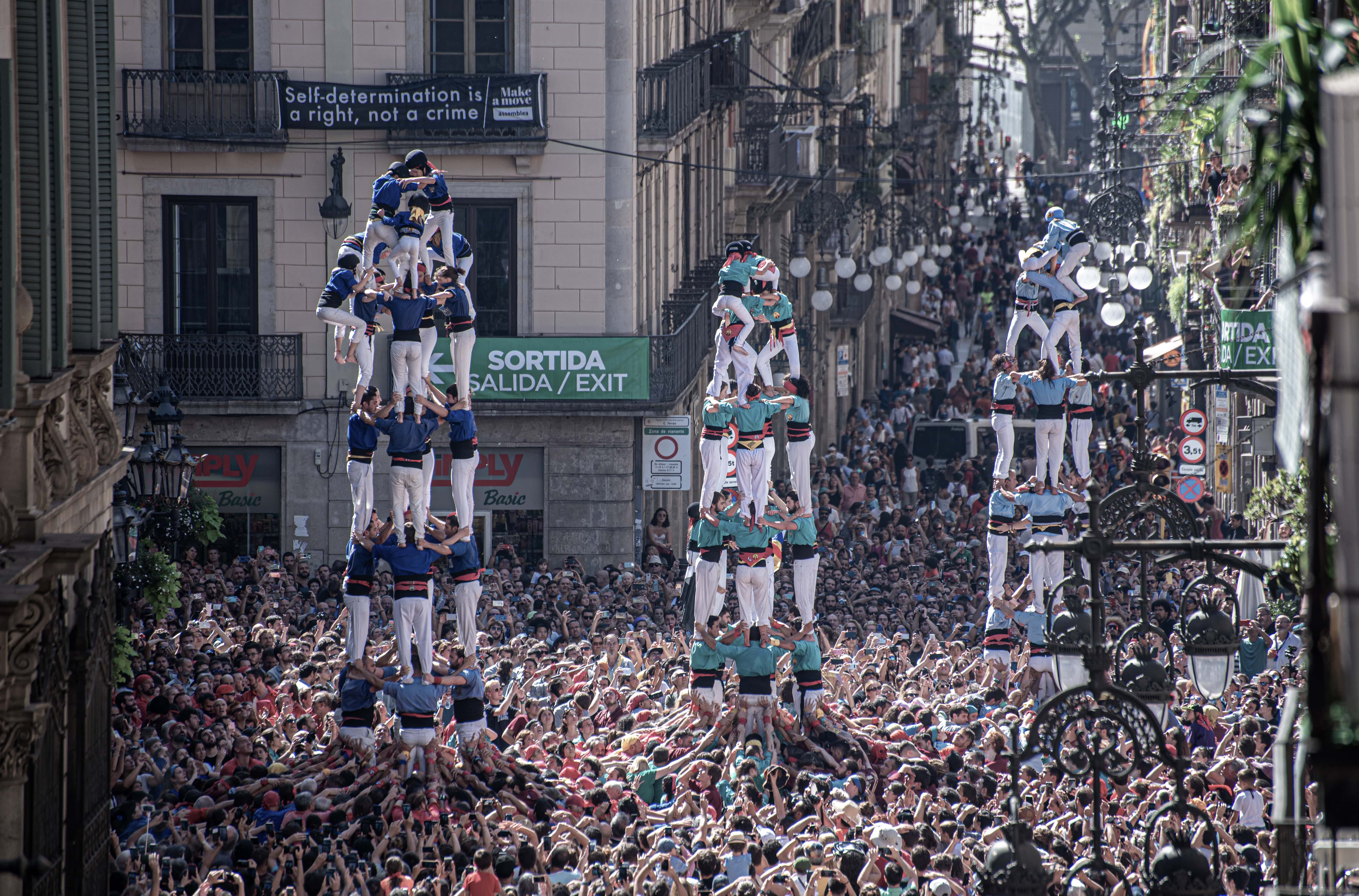 fly drvn long distance car service is also built for group travel, perfect for this group of castells in Barcelona.
